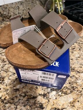 Birkenstock Arizona Two-Strap Sandals in Taupe with Copper Buckles
